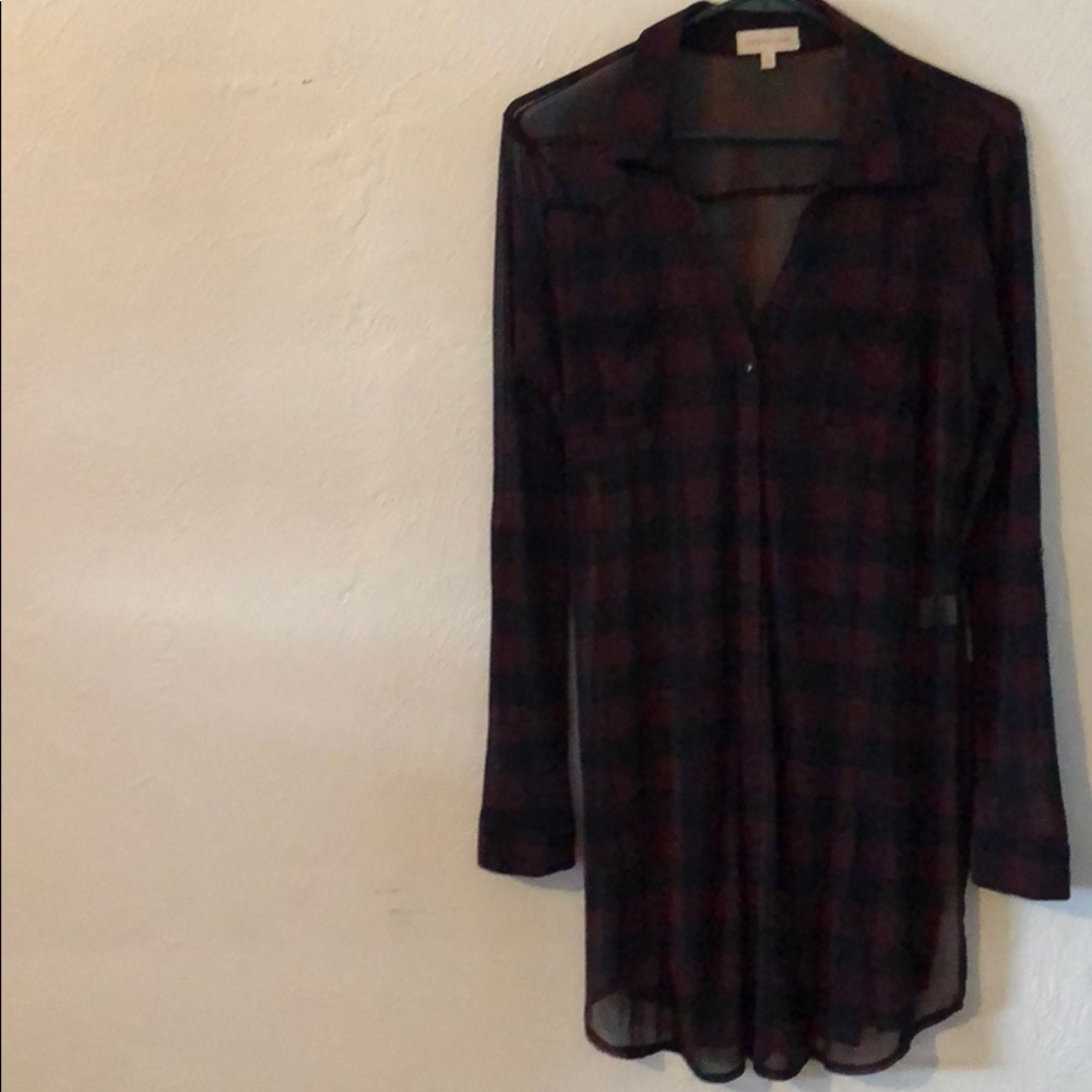 Long sheer flannel shirt. Size medium.
